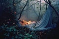 a woman laying in a bed in the woods