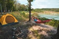 woman laying on hammock at camp near lake summer hiking concept Royalty Free Stock Photo