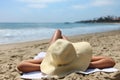 Woman Laying Out Sunbathing at the Beach Royalty Free Stock Photo