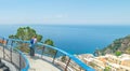 Woman leaning on a balustrade in world famous Positano