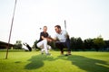 Woman learning how to play golf - Image Royalty Free Stock Photo