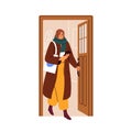 Woman leaving home, opening house door, exiting outside. Person in coat, holding mobile phone in hand, going out to work