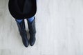 Woman legs  black cowboy boots with cowboy hat close-up Royalty Free Stock Photo