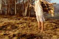 Woman legs in native indian american boho dress walking in windy