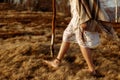 Woman legs in native indian american boho dress walking in windy Royalty Free Stock Photo