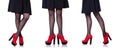 The woman legs with red shoes isolated on the white Royalty Free Stock Photo