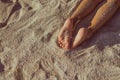 Woman legs on sand beach Royalty Free Stock Photo