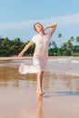 Woman legs walking on the beach sand Royalty Free Stock Photo