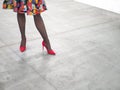 Woman legs wearing red high heels shoes Royalty Free Stock Photo