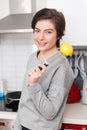 Woman with lemon and knife Royalty Free Stock Photo