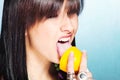 Woman lick lemon