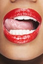 Woman Licking Red Lips Royalty Free Stock Photo