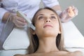 Woman lies on a table in a beauty spa