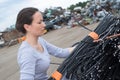 Woman lifting bundle cables