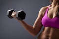 Woman Lifting Dumbbell