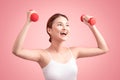 Woman Lifting Weights. Fitness woman lifting weights smiling hap