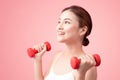 Woman Lifting Weights. Fitness woman lifting weights smiling hap