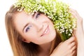 Woman with lily of the valley Royalty Free Stock Photo