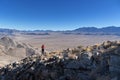 Woman On Limestone Ridge On Nevada Desert Peak