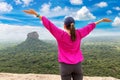 Woman and Lion Rock in Sigiriya Royalty Free Stock Photo