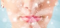 Woman lips blowing abstract white lights - close up Royalty Free Stock Photo