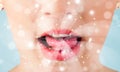 woman lips blowing abstract white lights - close up Royalty Free Stock Photo