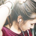 Woman Listening Music Media Tied Up Ponytail Concept