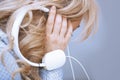 Woman listening music via headphones Royalty Free Stock Photo