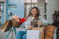 Woman listening music via headphones and digital tablet Royalty Free Stock Photo