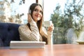 Woman listening to audiobook at table Royalty Free Stock Photo