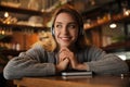 Woman listening to audiobook at table Royalty Free Stock Photo