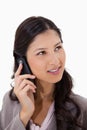 Woman listening to caller on the phone