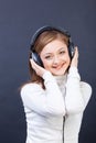 Woman listening to music in headphones Royalty Free Stock Photo