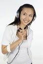Woman listening to music on headphones. Conceptual image Royalty Free Stock Photo