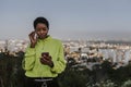 Woman listening to music from a phone