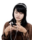 Woman listening to sad music with the phone Royalty Free Stock Photo