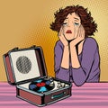 Woman listening to sad music, retro vinyl record player Royalty Free Stock Photo