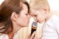 Woman with little boy singing Royalty Free Stock Photo