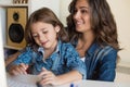 Woman and little girl using computer Royalty Free Stock Photo