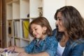 Woman and little girl using computer Royalty Free Stock Photo