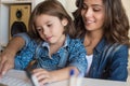 Woman and little girl using computer Royalty Free Stock Photo