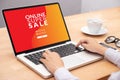 Woman login with password on laptop computer for shopping online website with promotion sale discount campaign on screen. Royalty Free Stock Photo