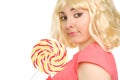 Woman with lollipop (focus on face) Royalty Free Stock Photo