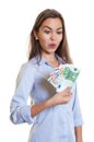 Woman with long brown hair earns money Royalty Free Stock Photo