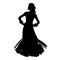 Woman in long dress stay in dancing pose. flamenco dancer, spanish. beautiful female profile black silhouette Isolated on white Royalty Free Stock Photo