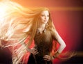 Woman with long hair. Beautiful young stylish fashionable girl w Royalty Free Stock Photo