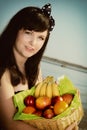 Woman long hair holding basket fruits summer