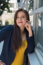 Woman with long hair posing with hand on her face Royalty Free Stock Photo