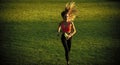 Woman with long hair run with water bottle, drink Royalty Free Stock Photo