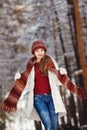 Woman with long hair and wearing warm clothes Royalty Free Stock Photo